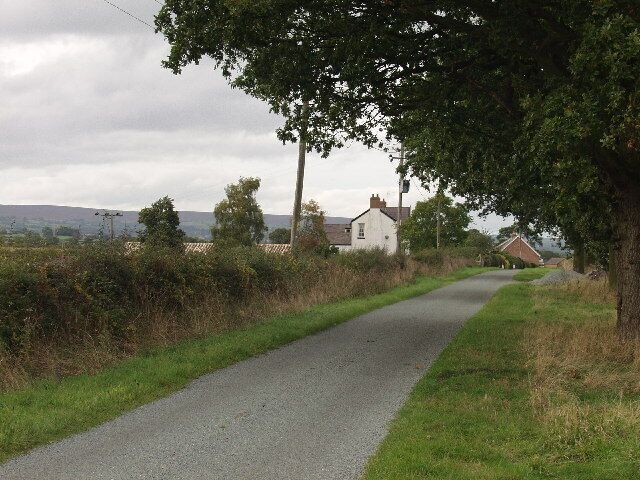 Redundant farm buildings at Plas Goulbourn. Redundant farm buildings in the process of conversion to domestic properties.