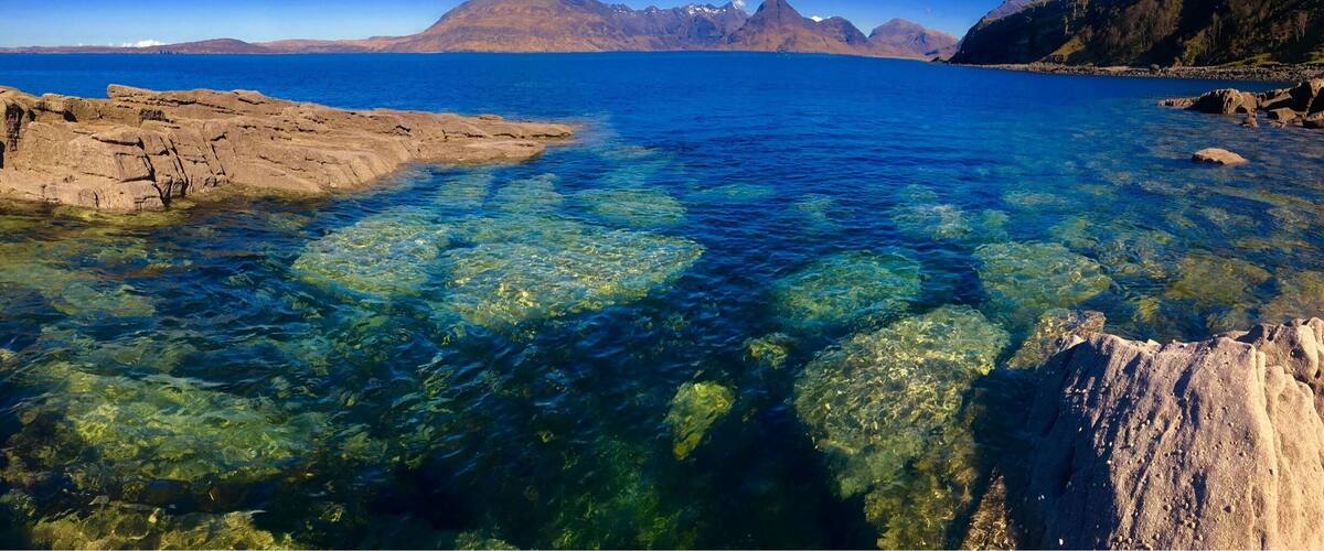 When the sky was just too blue in Elgol on the Isle of Skye the clear waters catch your attention. With the Cuillin range in the distance that fantastic rocky shoreline draws my attention. What’s missing form the photos it the local school is just off the harbor and the kids get to play here everyday when school in. What a place to grow up.
#BVSblue