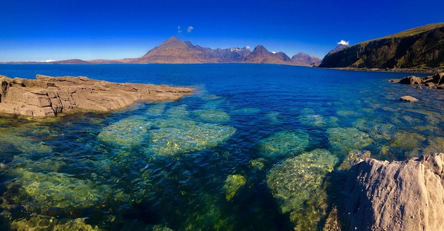 When the sky was just too blue in Elgol on the Isle of Skye the clear waters catch your attention. With the Cuillin range in the distance that fantastic rocky shoreline draws my attention. What’s missing form the photos it the local school is just off the harbor and the kids get to play here everyday when school in. What a place to grow up.
#BVSblue