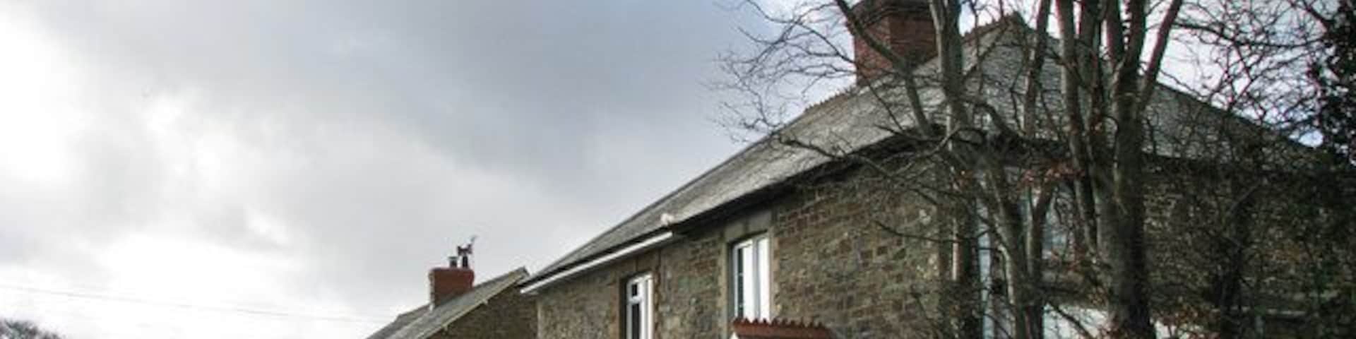 Cottages at Mambury Cross Typical stone built Devon cottages.
