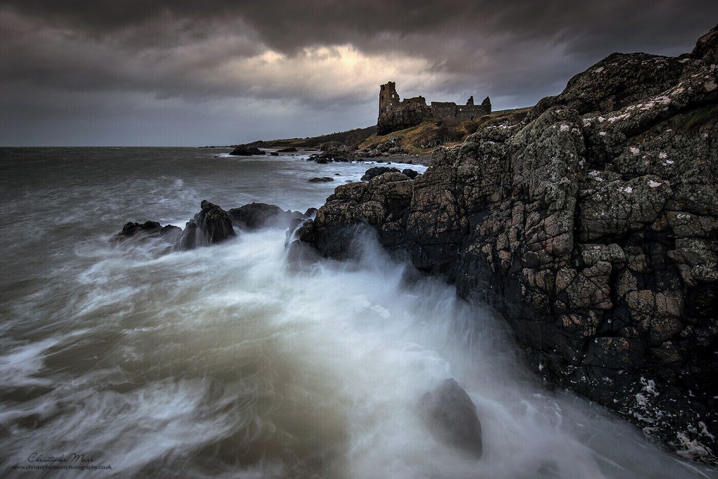 Stormy conditions and a castle, I was soaking but very happy to be there
