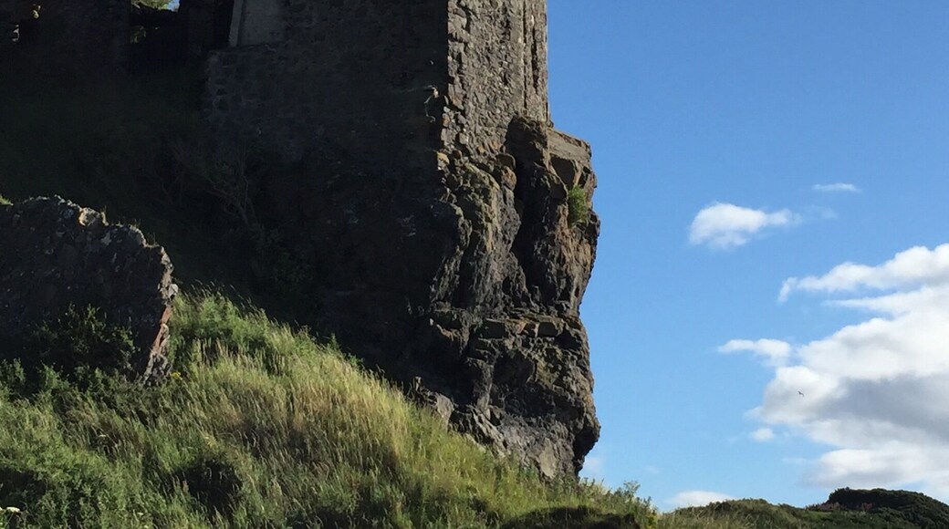 Walk the beach, climb up to the castle and scramble over the ancestral pile.