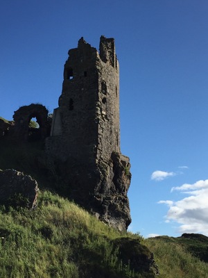 Walk the beach, climb up to the castle and scramble over the ancestral pile.