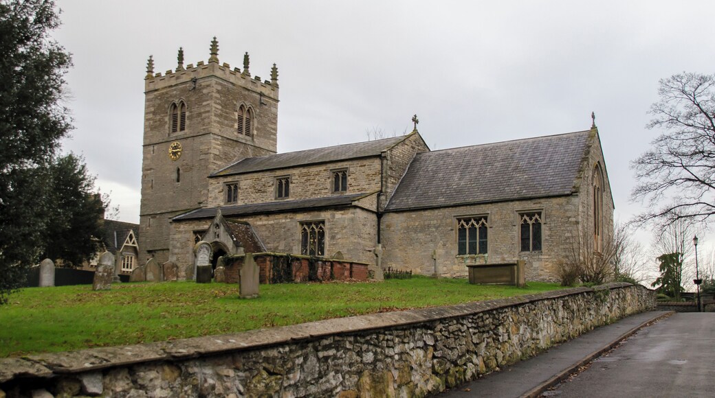 Early English but restored in 1856.