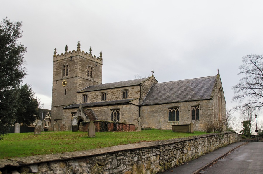 Early English but restored in 1856.