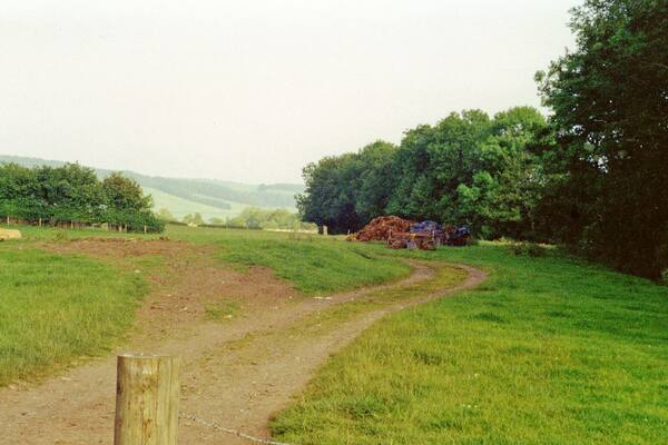 Site of former Dorstone station, 1994. View SE, towards Pontrilas: ex-GWR Pontrilas - Hay branch, also known as the Golden Valley line. The station was closed when the passenger service ceased from 12/12/41, but remained for goods until 2/2/53 and the line was not abandoned until 6/57.