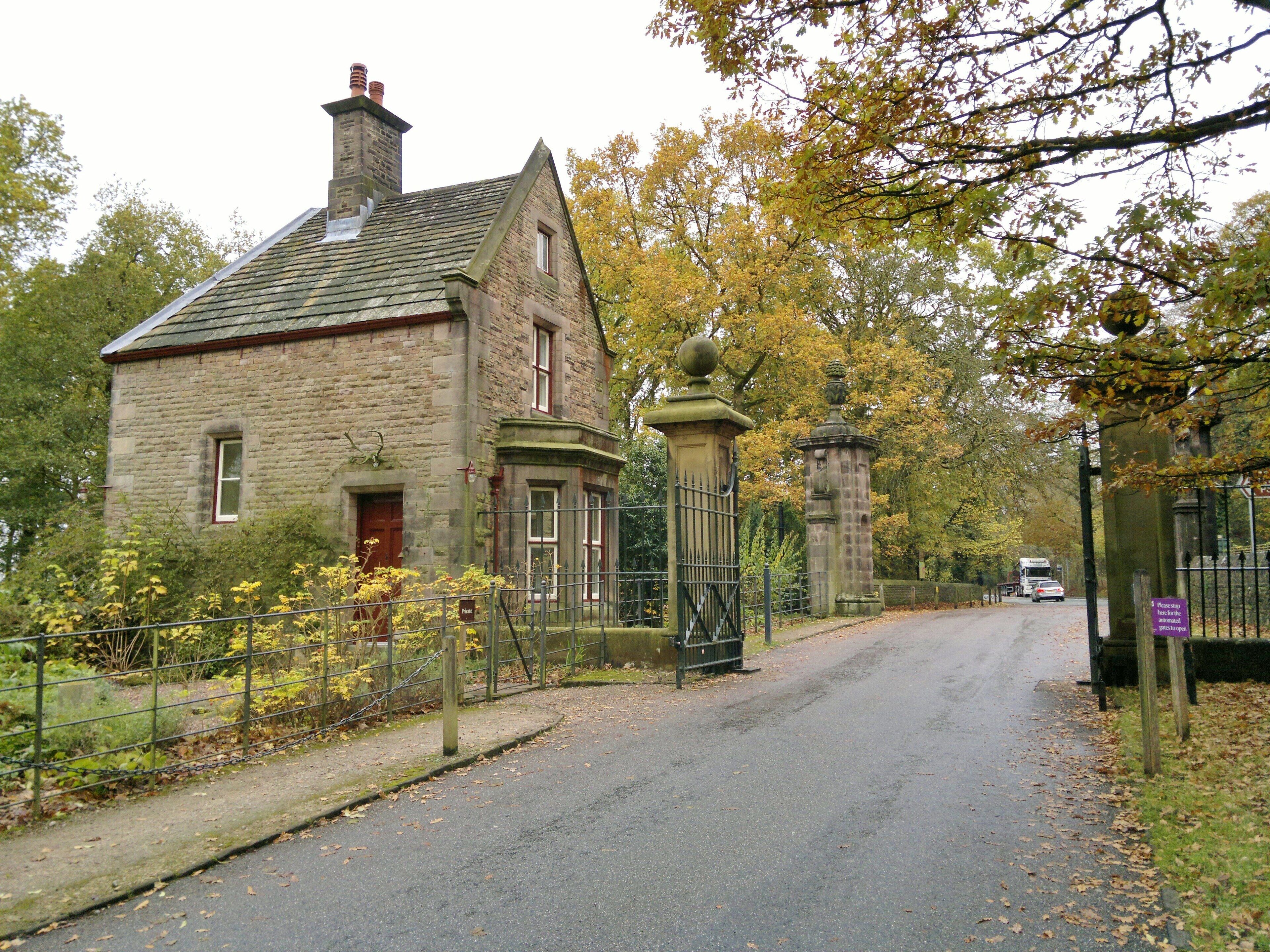 Photograph of the Lodge and gate piers to Lyme Park, Cheshire