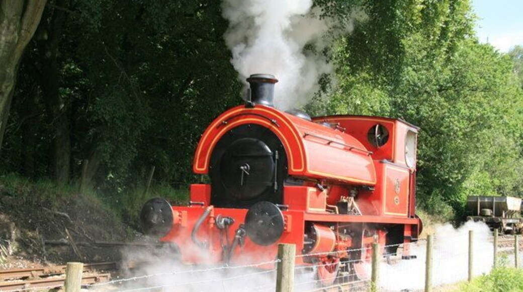 Foxfield Railway - Bagnall No. 2 transferring between trains. This is at Dilhorne Park Station during the Summer Steam Gala. The locomotive has just hauled a passenger train from Caverswall Road and has now changed tracks to take a freight on to Foxfield Colliery. Bellerophon, built 1874 by the Haydock Foundry, had brought the freight up the infamous bank and was to take the passengers back to Caverswall Road.