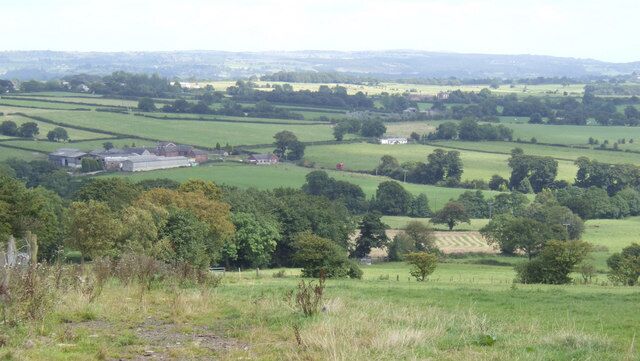 View east from near Banktop Over Staffordshire countryside towards the southern end of the Pennines and Derbyshire. Dairy House Farm is to the left of centre.