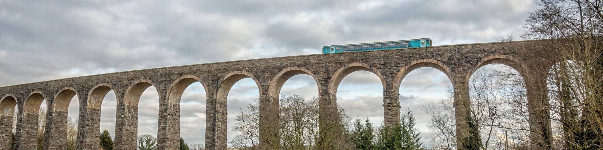 So as I was about to capture the impressive Victorian viaduct near Llandovery, a train traveling the heart of Wales line rolled past.