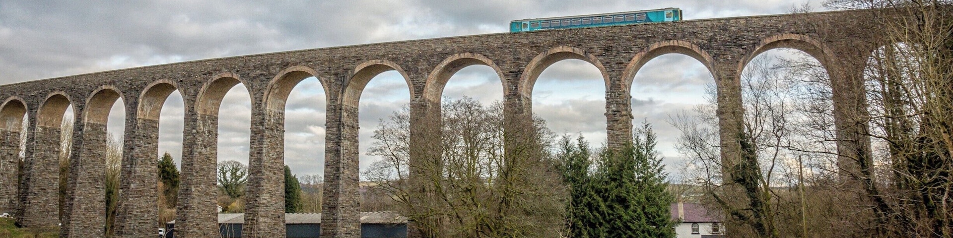 So as I was about to capture the impressive Victorian viaduct near Llandovery, a train traveling the heart of Wales line rolled past.