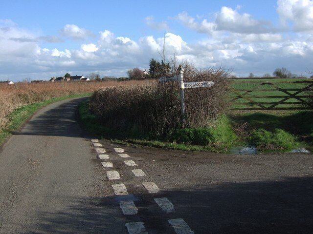 Lane junction near Field Gate Redland Lane continues ahead towards Pope's Cross, Curry Mallet, an the unnamed lane to the right heads south to Beer Crocombe.