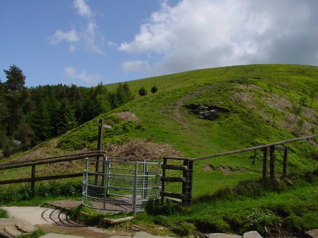 Kissing gate and path leading up to Twmbarlwm
