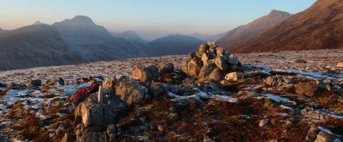 Cairn Eididh Frosty day in December looking towards the glacial trough of Fionn-abhainn and the mountains of Torridon in the distance. To south-west lies the little crofting hamlet of Coulags and the start of the walk to Annat. Lots of deer graze the area. No sheep at this height. Fox and a few eagles.