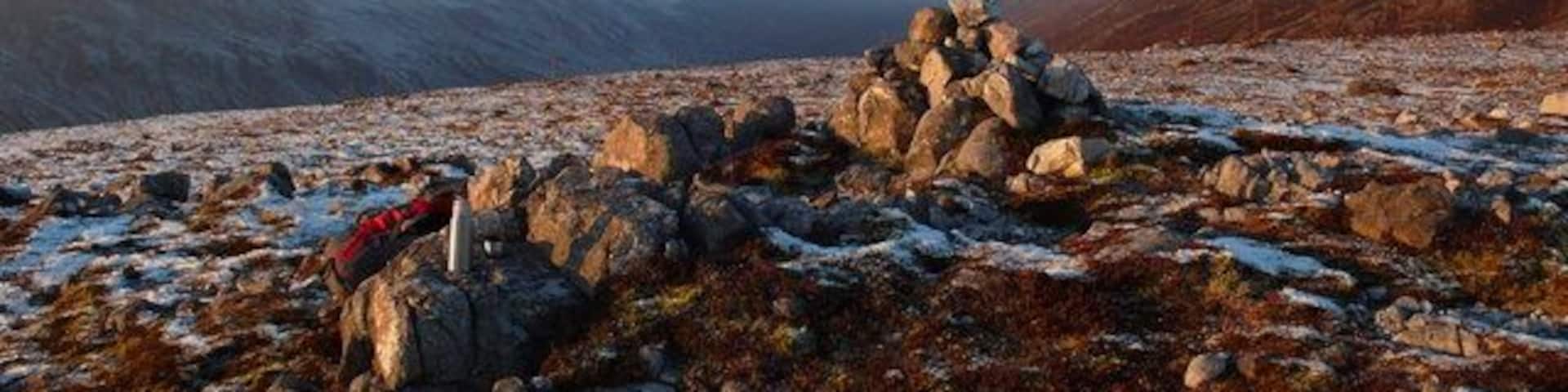 Cairn Eididh Frosty day in December looking towards the glacial trough of Fionn-abhainn and the mountains of Torridon in the distance. To south-west lies the little crofting hamlet of Coulags and the start of the walk to Annat. Lots of deer graze the area. No sheep at this height. Fox and a few eagles.