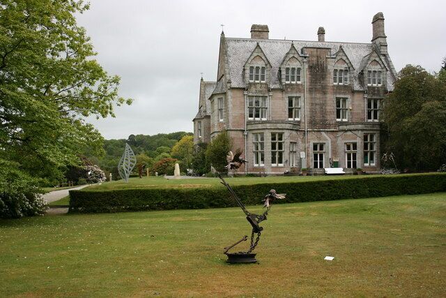 Delamore House, Cornwood The east front of this private house. In May annually an exhibition of artwork is staged in the house and its grounds - some of the garden sculptures can be seen on this grey and damp Dartmoor day.