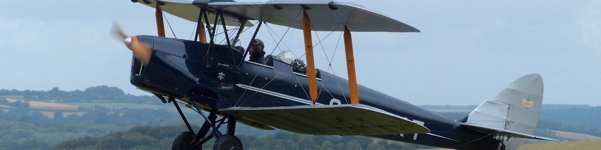 It was "Lady Pilots Day" at Compton Abbas airfield so I popped in to see what was flying. The weather was a bit mixed but there were a few nice aircraft to be seen.
This was taken with the Panasonic FZ200 bridge camera which I thought I would try out on aircraft. The main problem is the max aperture only goes to F8 so its tricky getting the speed low enough to blur props without over exposing.