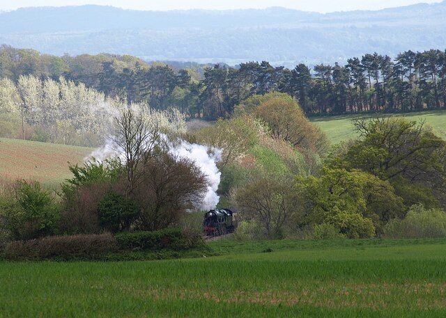 Locomotive on West Somerset Railway A distant steam train seen from the lane between Nethercott and Combe Florey.