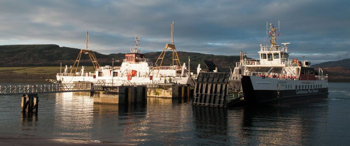Ferry terminal at Colintraive. The terminal at Colintraive is on one of the Argyll peninsulas; it's at the mainland end of a ferry crossing route to the Isle of Bute which is the land in view. The ferry 'Loch Dunvegan' is at anchor with another, 'Loch Alainn' at the right side of the image, arriving from the island.