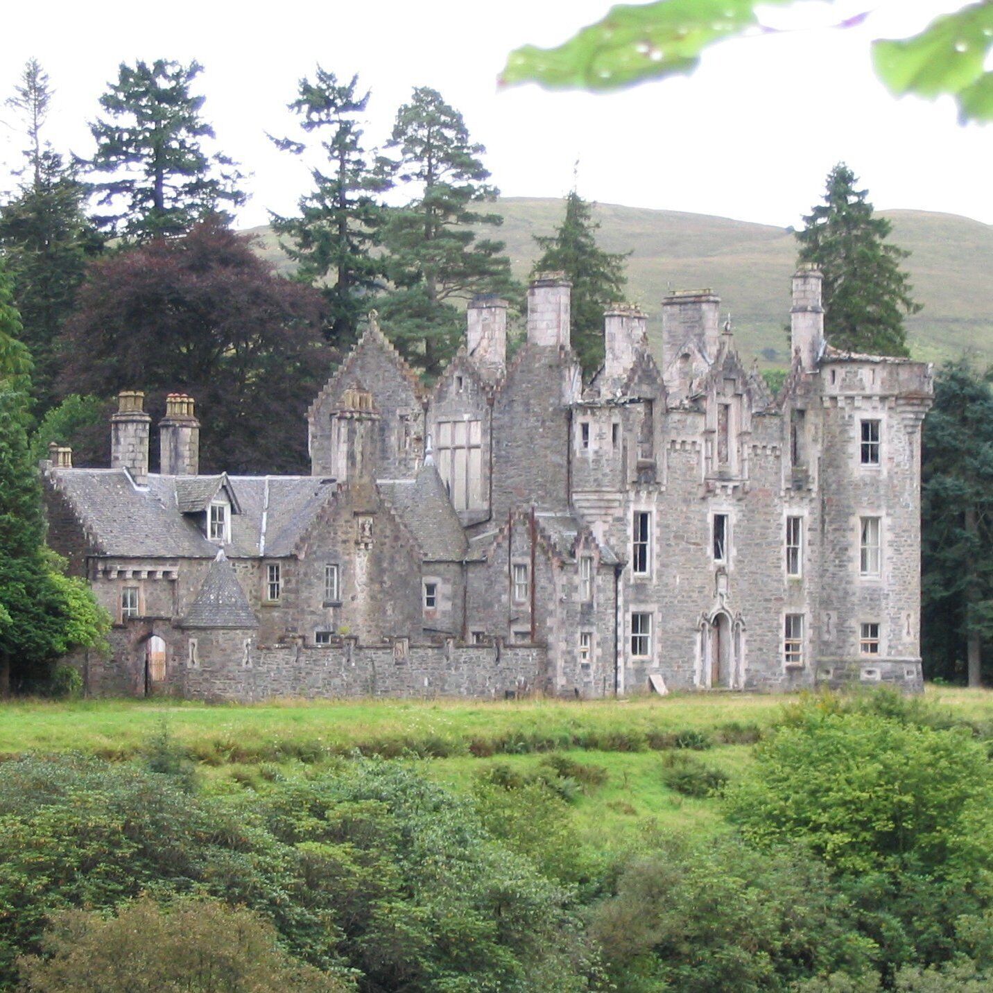 Dunans Castle, Clachan of Glendaruel, Colintraive PA22 3AD, United Kingdom
Located on the Cowal Peninsula, this castle is in the restoration process by current owners.  
credits: this image is from Wikipedia