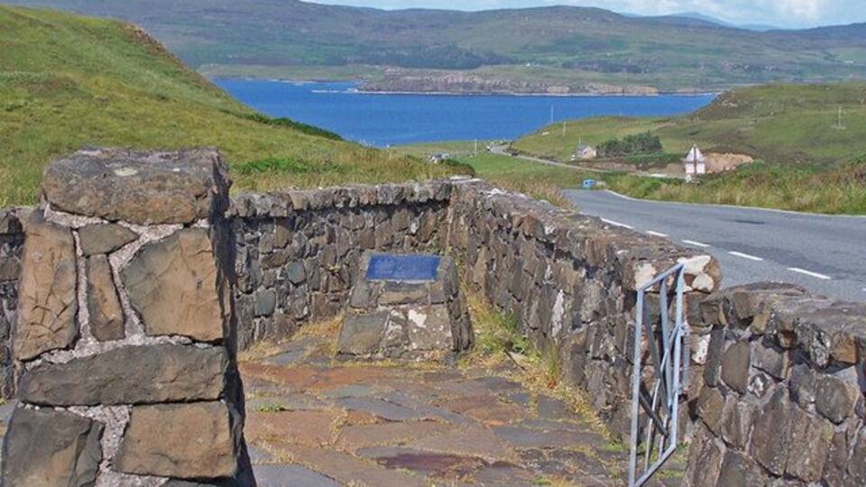 Glendale Land Leaguers monument The monument is enclosed by a stone wall close to the site of the 'Invasion of Glendale' in 1883. This view looks down the hill towards the township of Colbost.