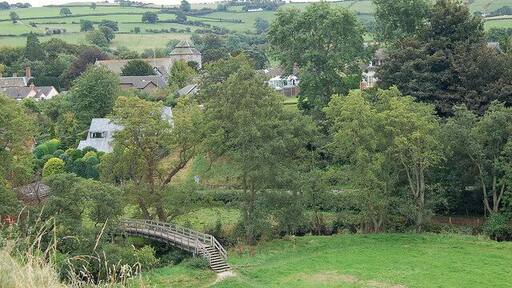 Footbridge and church A prospect of the town from just below the castle.