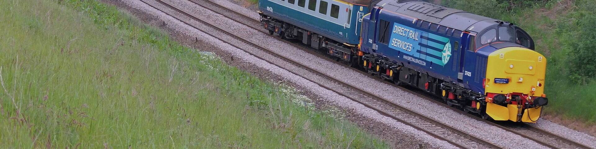 Ex works 37425 leaves Claycross Tunnel working 5Z33 Barrow Hill - Crewe