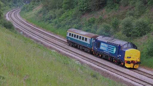Ex works 37425 leaves Claycross Tunnel working 5Z33 Barrow Hill - Crewe