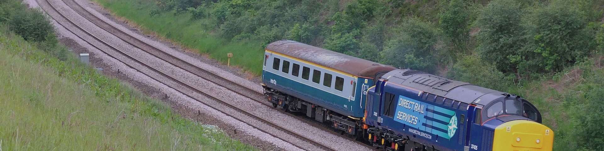 Ex works 37425 leaves Claycross Tunnel working 5Z33 Barrow Hill - Crewe
