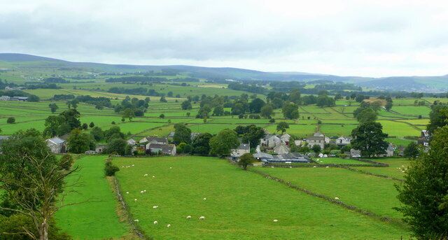 View of Chelmorton Townend Showing the parallel fields of un-enclosed land. The landscape around Chelmorton is of historic importance in that evidence of medieval pre enclosure or strip farming has been preserved. Cultivation took place in usually huge open fields surrounding a village and each villager owned a number of strips in each field. This open field system meant that every operation must be conducted in common by all villagers, and no one could produce crops at a different time or that which required different treatment from its neighbours. Changes in agricultural practices from the 16th century onwards led to the disappearance of the open system and increased prosperity changed the mediaeval village beyond recognition. Except at Chelmorton, where the land was considered of such a poor quality, that enclosure was not considered worthwhile and so the field pattern has remained untouched.