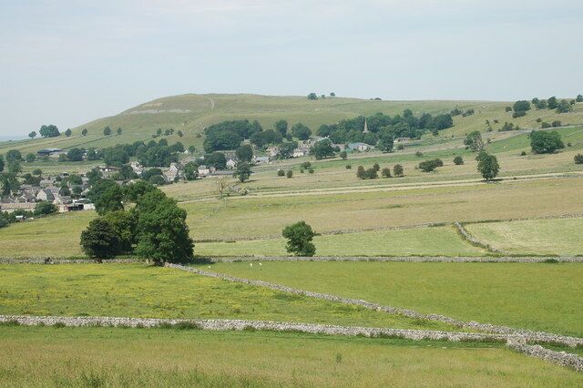 Dry stone walls at Chelmorton The marks on the hill overlooking the village state 'ENGLAND'.