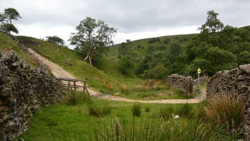 Ford at Roych Clough. The yellow notice advises a 5 mph speed for 4*4 vehicles and 20 mph for trail bikes.