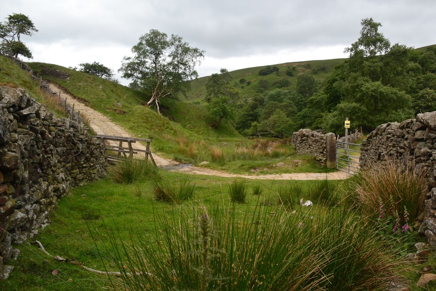 Ford at Roych Clough. The yellow notice advises a 5 mph speed for 4*4 vehicles and 20 mph for trail bikes.