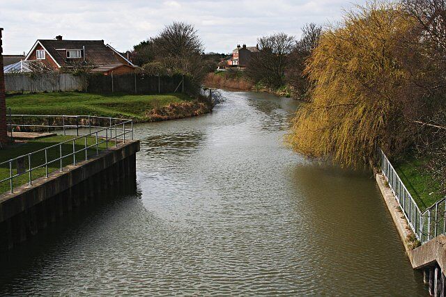 River or Drain at Chapel St Leonards This waterway was probably originally a river but has since been dug out and widened and the water dammed back.