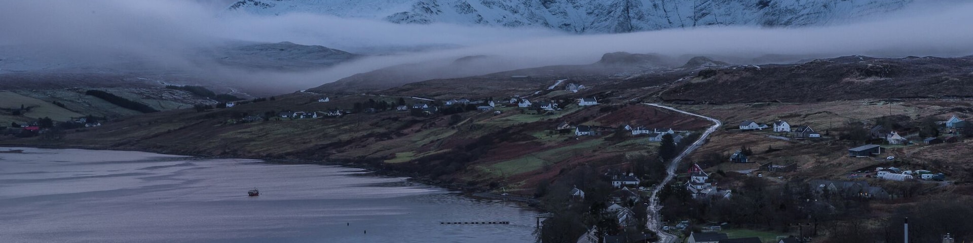 I was in the kitchen, making myself a morning cuppa when I saw the pink sunrise and the thick misty fog coming from the magnificent Cuillin Mountains past Loch Harport. I quickly put a coat on and ran in my pyjamas to capture this. I am sure I saw a local driving past me on the icy road muttering something about crazy tourist :D
#hiddenscotland #discoverscotland #isleofskye #cuillins #igscotland #explore #ig_scotland #scotland_insta #scotland_ig #uk #perspectives #mountains #loch #winter #walking #hiking #outdoors #britain #scotland #carbost #travel #nature #skye #ontheroad