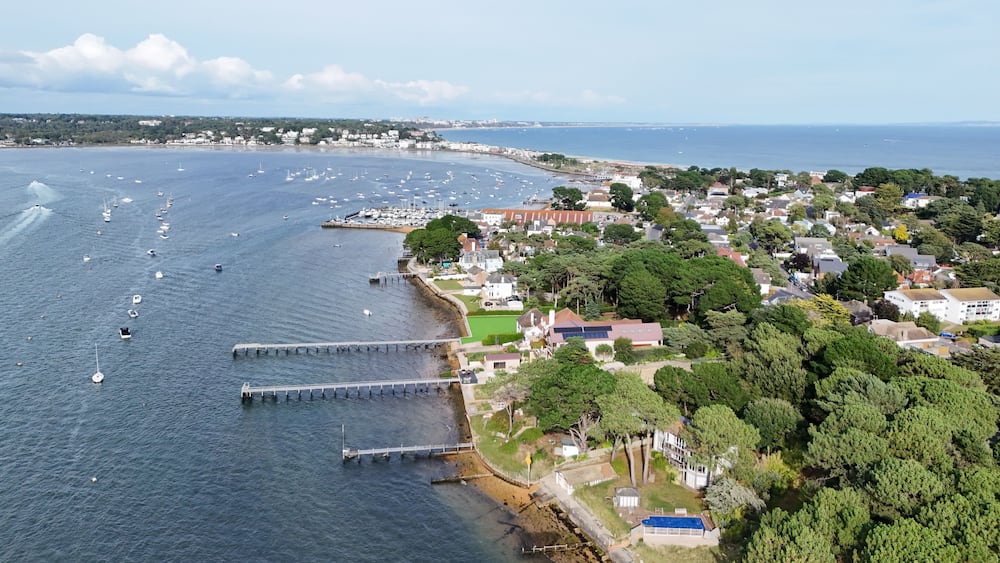 .Poole harbour and Sandbanks Dorset UK affluent neighbourhood of Poole, aerial