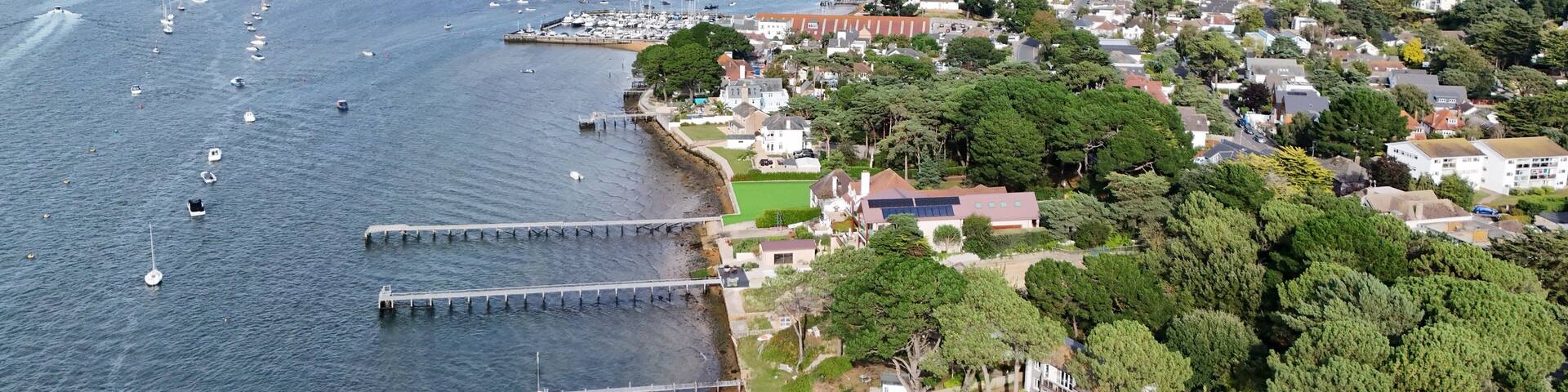 .Poole harbour and Sandbanks Dorset UK affluent neighbourhood of Poole, aerial