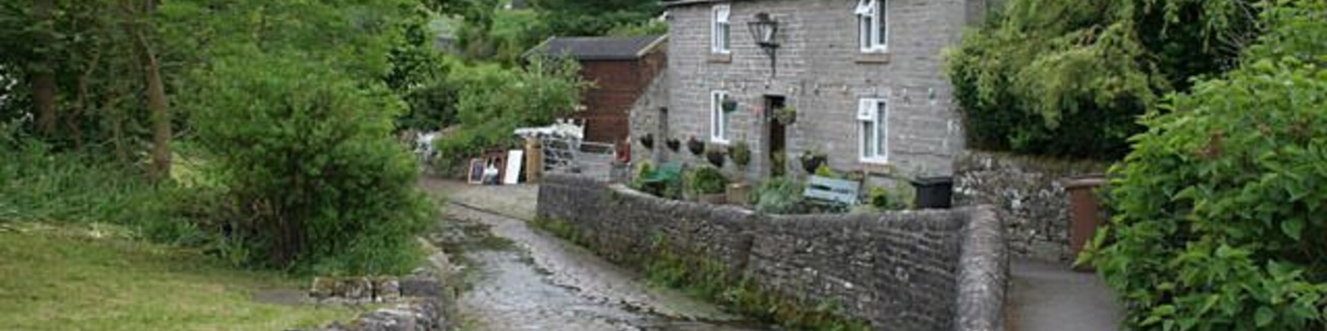 The ford at Butterton The road runs along the stream bed (or is it the stream running along the road bed?) for some 70 metres