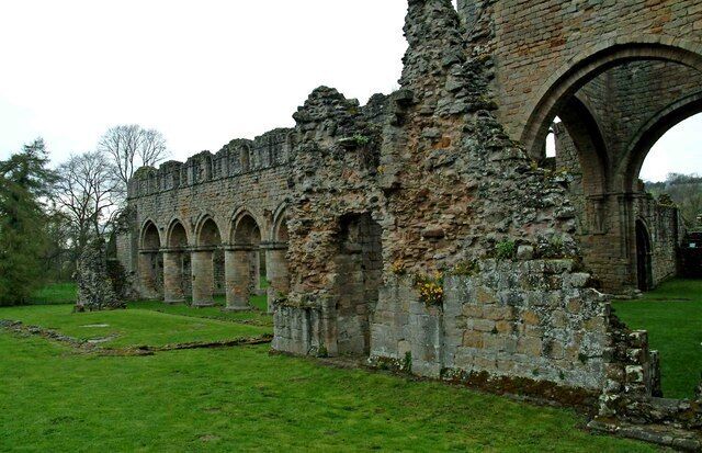 Buildwas Abbey - south exterior of nave & tower Always a small abbey with often only a handful of monks. It was founded in 1135, and dissolved exactly 400 years later in 1535. In 1342 the abbot was murdered by one of his own monks.