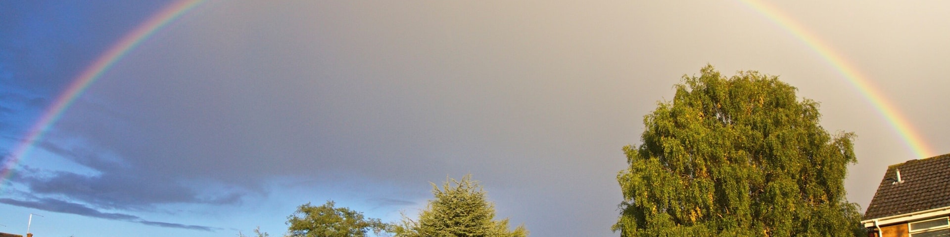 ...a photographer stands getting rather wet! A rainbow (double) outside my house - the pot of gold is in my back garden so I'm off to get my shovel!