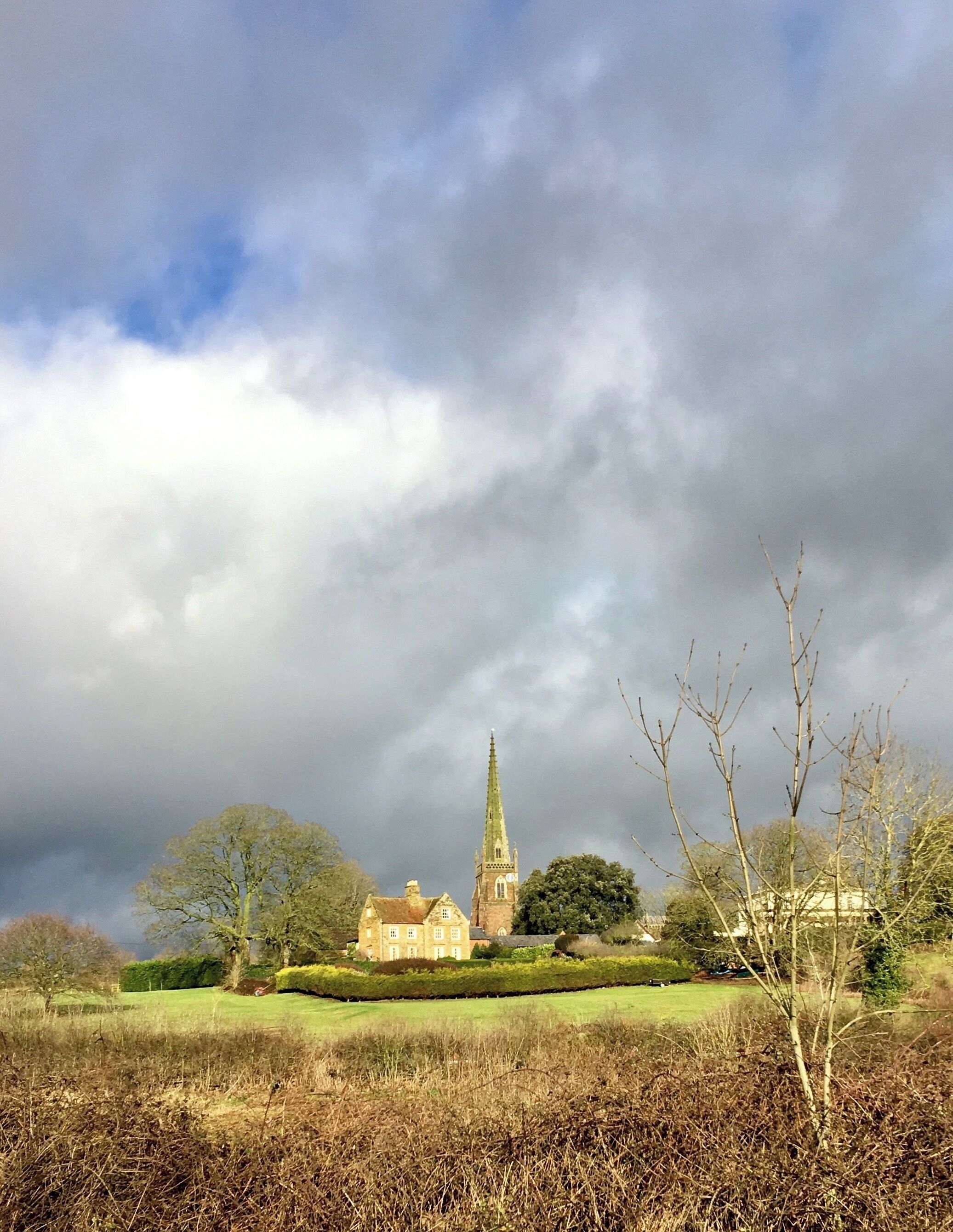 A break in the clouds over Braunston, Daventry, England from Braunston Marina.