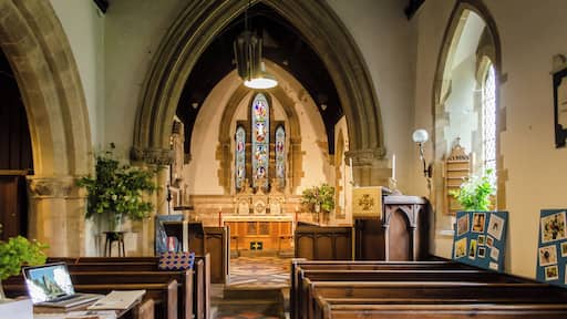 Grade II*listed. Brattleby is mentioned in the Domesday book of 1086, when it was known as "Brotulbi". The church originally dates from the late 11th century, but was restored and rebuilt in 1858 by James Fowler. There is a west tower, with short pyramidal spire, nave with north aisle, chancel, and chapel. The tower dates from the 11th century, but was refurbished in the 14th century and restored in the 19th century. There are three bells, two date from 1450. The nave and chancel were rebuilt in 1858, although 12th century north arcade bays remain. The north-east arch to the chapel is from the 14th century, there is also a piscina in the north chancel wall of that date. The altar has a marble reredos with kneeling Angels, in memory of the two sons of S. W. Wright of Brattleby Hall. The church was restored in 2013 at a cost of £130,000, funded by English Heritage. There is an Anglo-Saxon shaft of a cross in the churchyard.