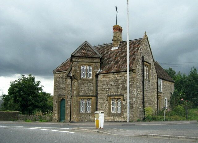 Yeovil Bridge Tollhouse Unfortunately it is very difficult to take a photograph of the front of this building without standing in the next gridsquare as the line runs just by it. The building is built in stone and looks Victorian but is probably much older.