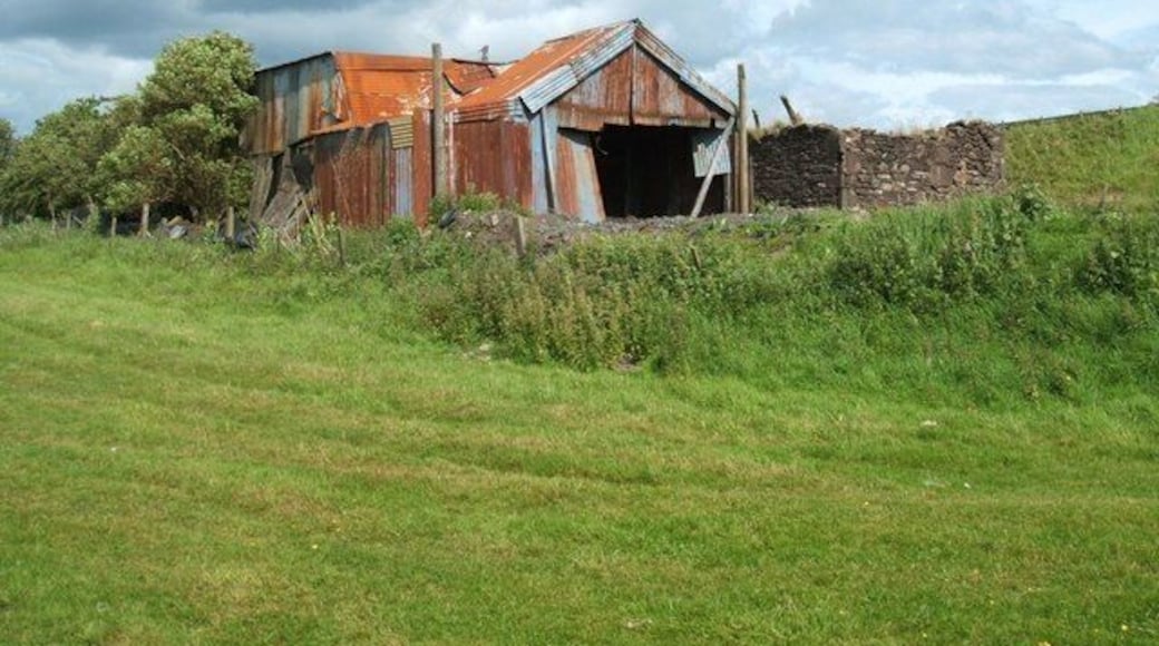 First Sight This is the first 'building' that anyone sees, coming off the A9 slip road for Greenloaning. It is from a slightly different angle though. The original stonework is nearer the slip road. The corrugated iron building defies any description. It does though, have a certain quaintness. It backs on to grazing land, but there were no animals near on this afternoon.