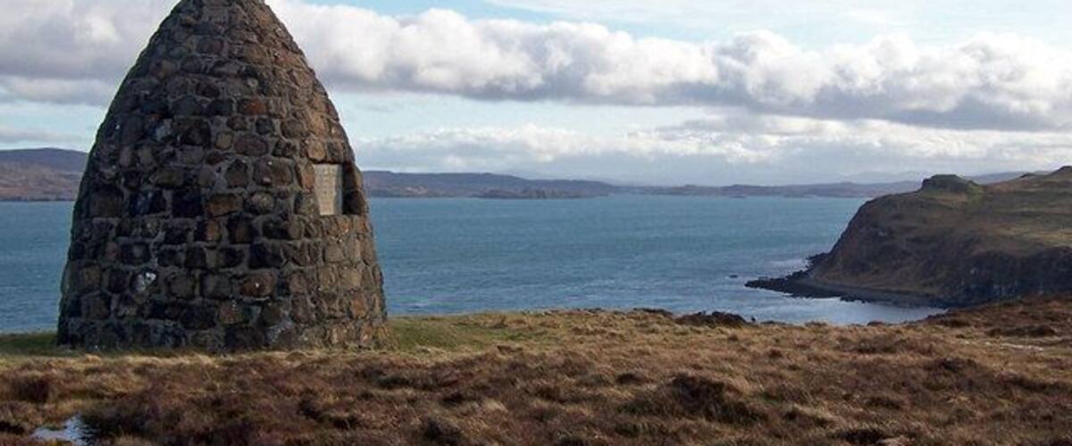 The MacCrimmon Memorial and view. The memorial stands above Loch Dunvegan. Cairn 1129575 , Detail 1129586.