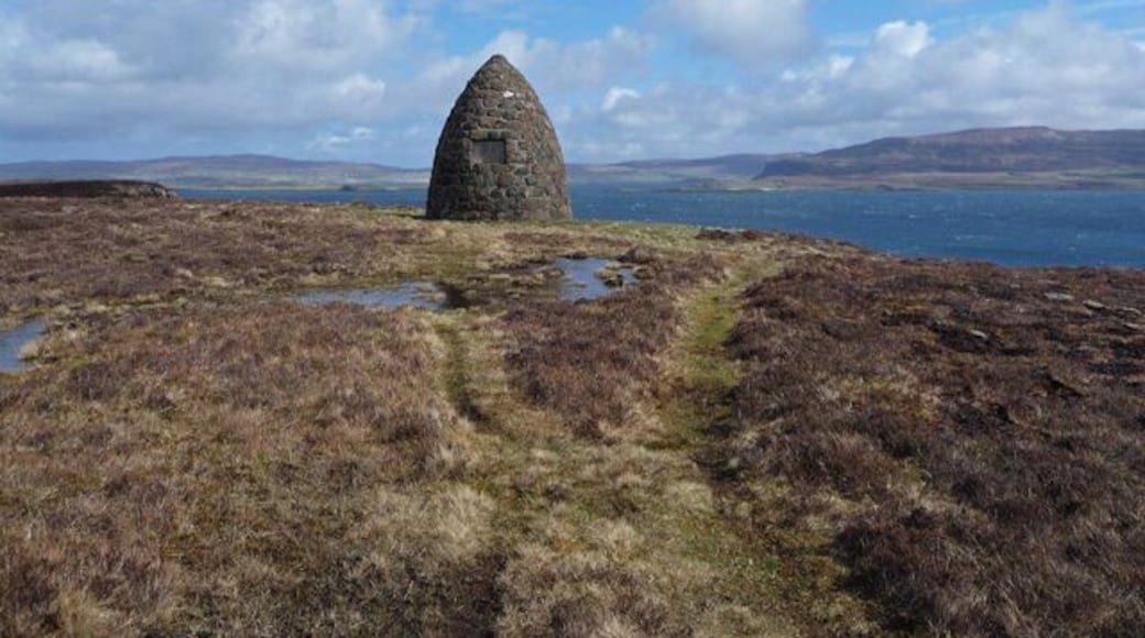 The MacCrimmon memorial cairn The cairn sits on Boreraig Hoe above Loch Dunvegan. The inscription on it is in Gaelic. It translates (to the best of my limited ability) as: "Remembrance cairn for the Clan MacCrimmon, hereditary pipers to the Macleods for ten generations and who were famous as writers, players and teachers of bagpipe music. Close to this place was the MacCrimmon music school from 1500 to 1800 AD."