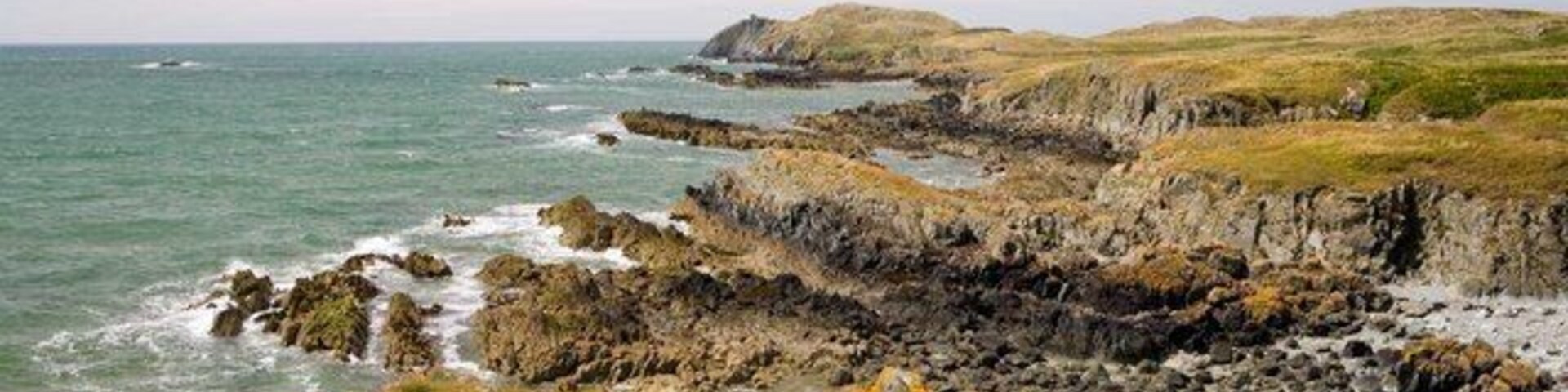 Yr Ebolion and Caseg Malltreath Yr Ebolion is the rocky point in mid photo, with Pen y Parc beyond, and Caseg Malltreath is the islet almost awash just below the horizon to the left.