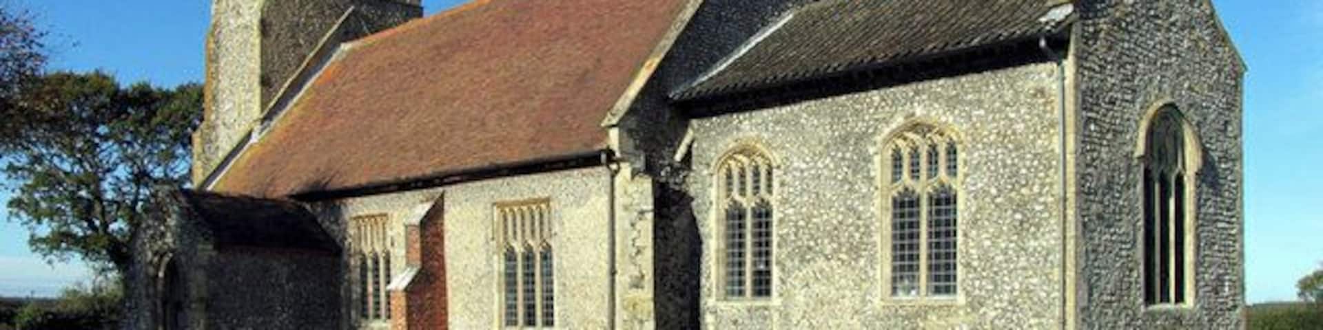 All Saints' parish church, Bodham, Norfolk, seen from the southeast