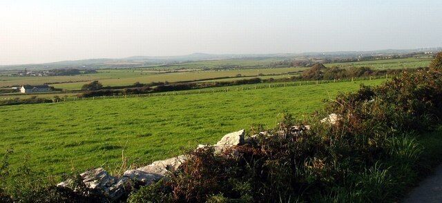 The Anglesey countryside north-westwards from near Pen-yr-allt Pen-yr-allt means top of the hill. This hill top provides views extending NW as far as Mynydd y Garn and Carmel Head.