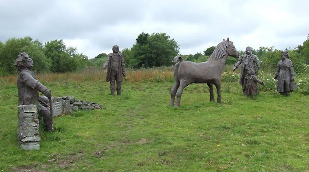 Roadside sculptures near Penuwch, Ceredigion This interesting group of sculptures is by B4577 near Penuwch. The accompanying plaque has become weathered and indistinct but Cered's image from 2005 states "A gift to the Community. The work of children of Ysgol Gynradd Penuwch.July 1993." What a pity the sapling planted by the old man on the bench has not thrived.